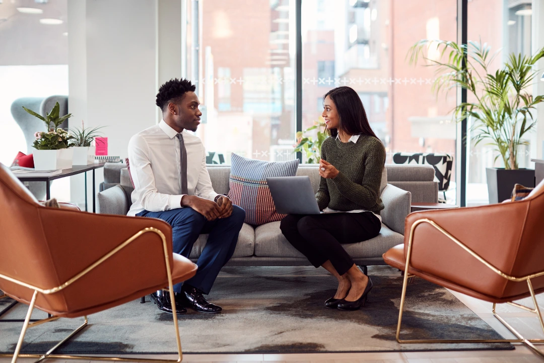 Image of woman interviewing a man for HR position and asking questions to see if he has the skills HR pros need today to get hired