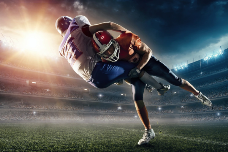 image of a football tackle for a blog post on tackling workplace change