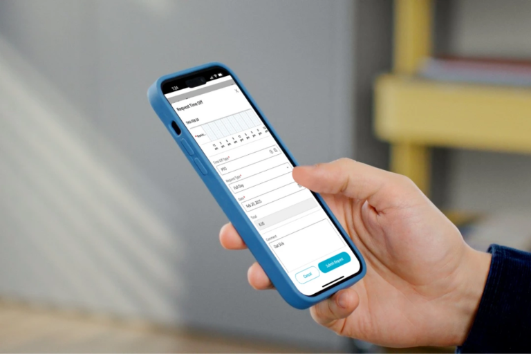 Employee submitting a time-off request via mobile app—showcasing how digital tools help build a PTO policy that’s simple, accessible, and retention-focused.